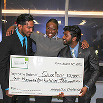 Winners of Innovation Challenge with big check