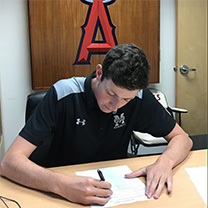 John Cain signing contract with Angels