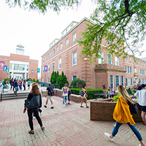 Students walking near O'Malley Library