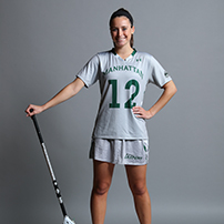 Emily Sandford holding lacrosse stick
