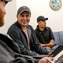 Student veterans laughing on campus
