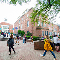 Students walking near library on campus