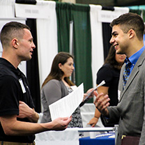 Student and employer at career fair