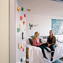 Students sitting in residence hall
